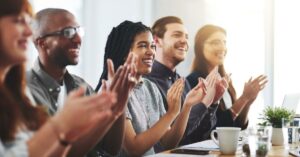 positive staff culture represented by clapping adults